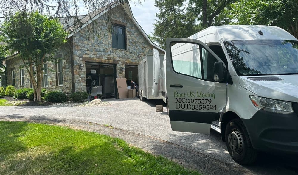 Moving truck parked outside a house, ready for a professional move in the US.