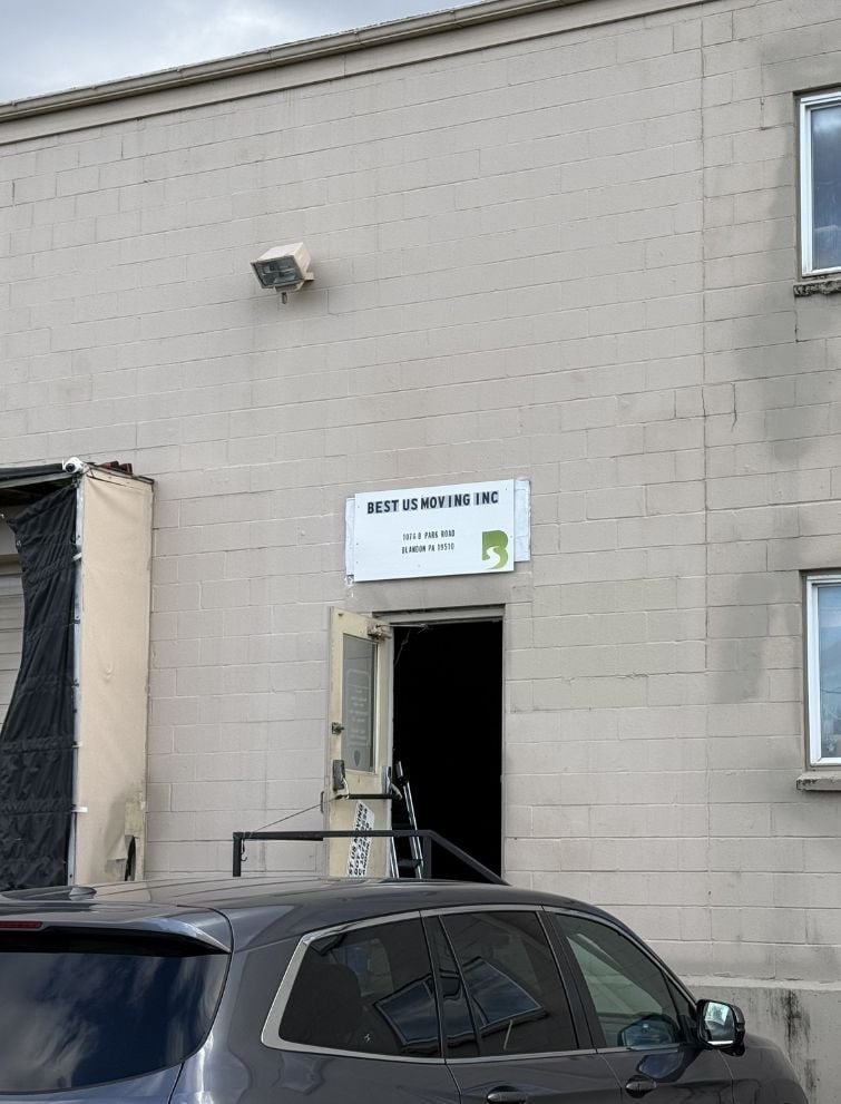 Office entrance of Best US Moving Inc., a top-rated US moving company.
