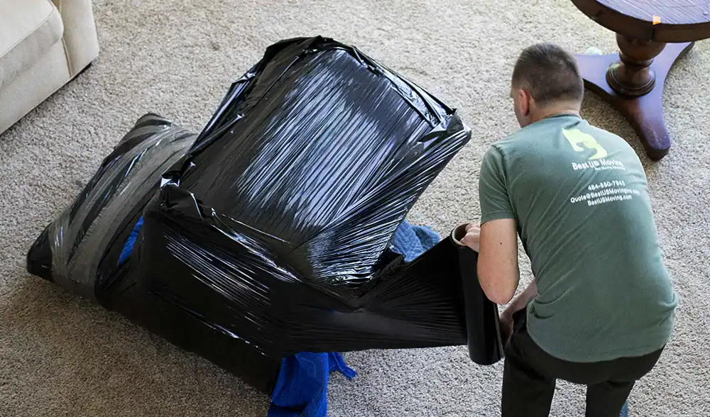 Moving boxes packed for a US move, ready for transportation.